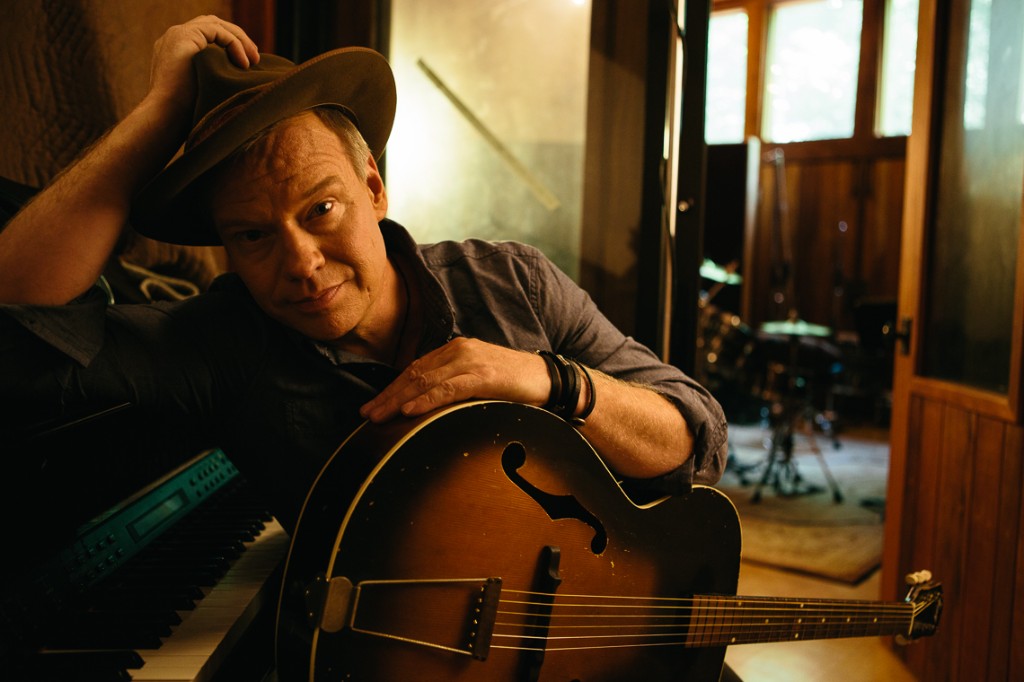 Shawn Mullins with a vintage archtop guitar